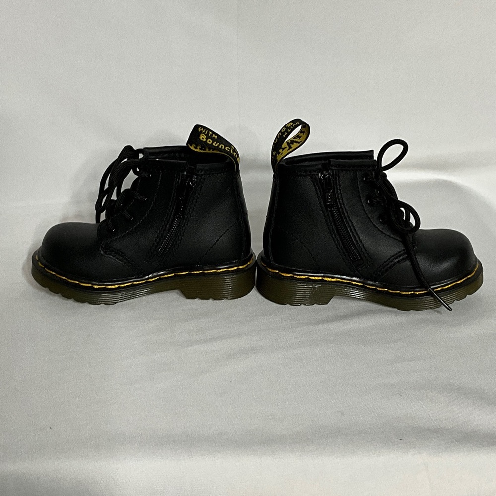 Dr. Martens Kids Black Boots with Bouncing Soles Yellow Stitching